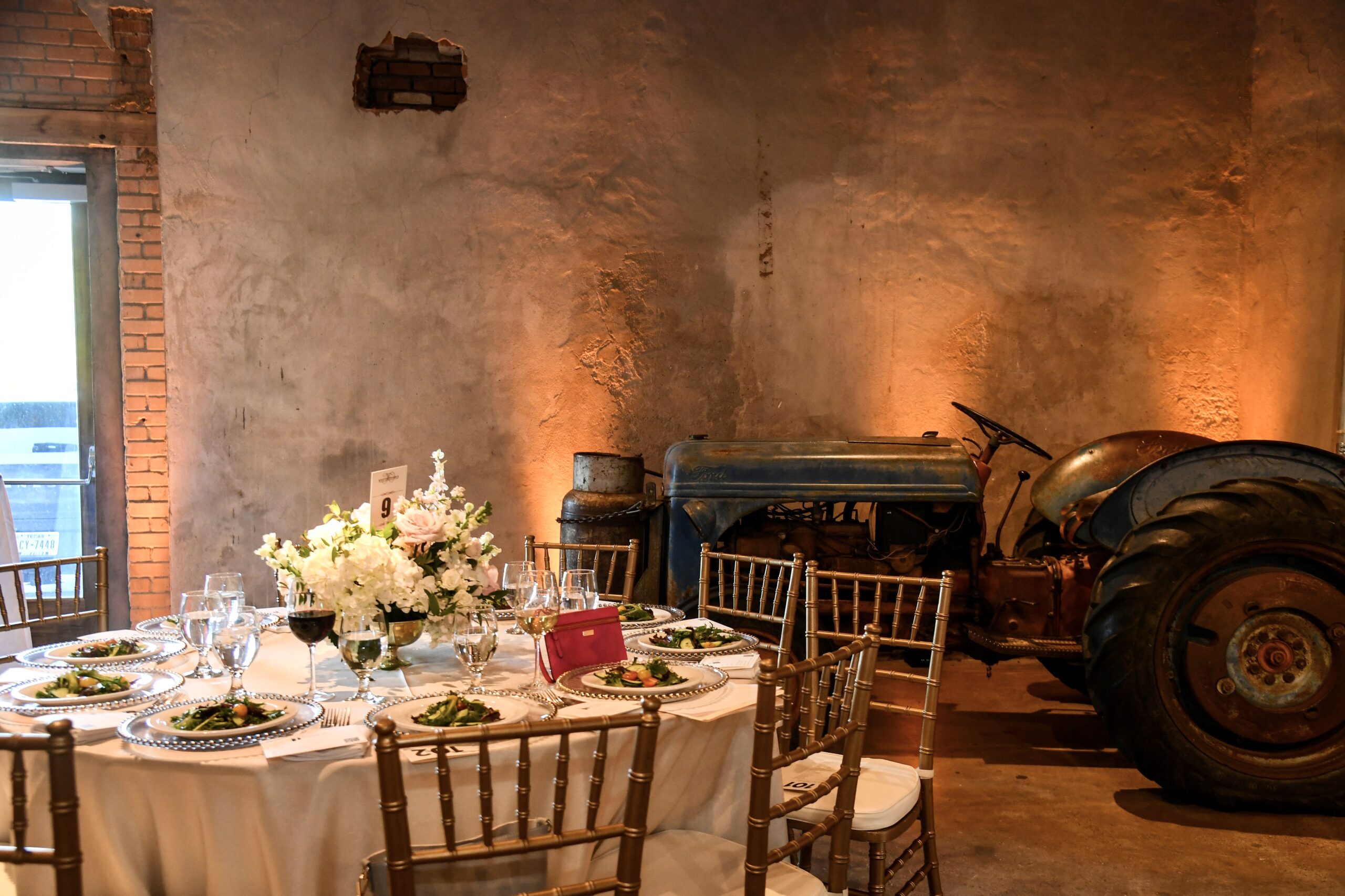 Table Setting with Rustic Tractor Decor in Back